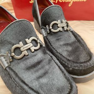 Ferragamo Black size 39pony hair, rubber soled loafers.